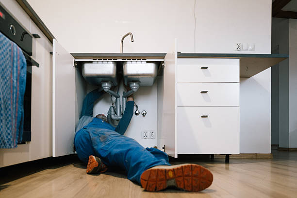 Professional Drain Cleaning technician working in Wheatland, IN